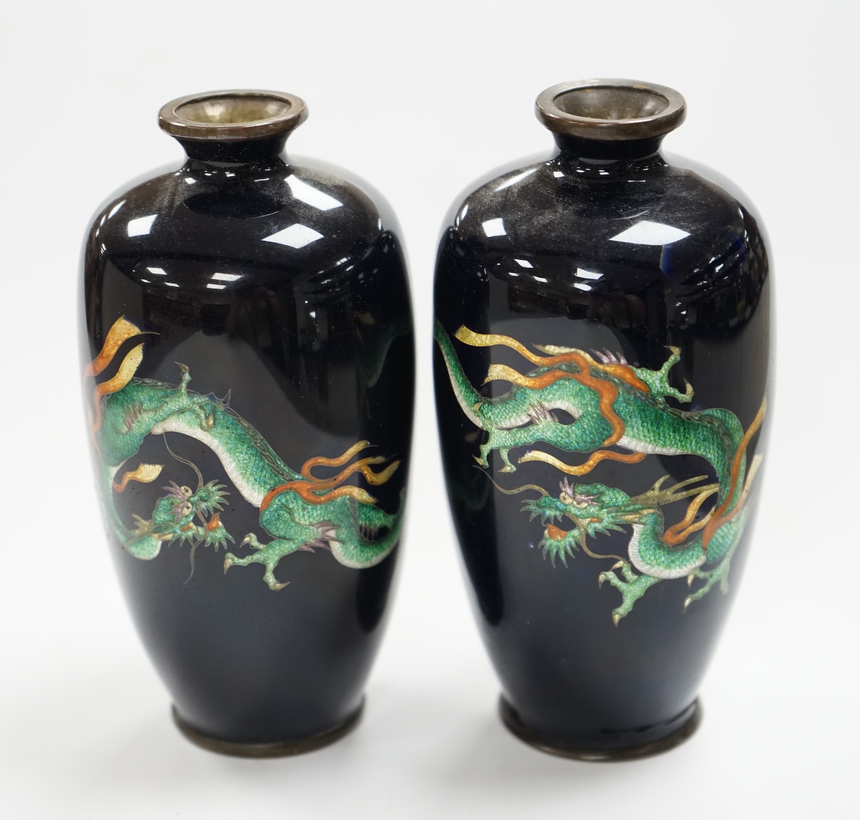 Two Japanese miniature enamelled dragon decorated vases,12cm high. Condition - good